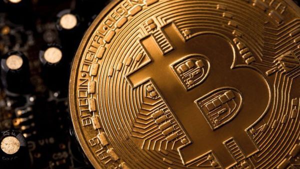 Giá tiền ảo Bitcoin lại tăng chóng, vượt mức 11.800 USD
