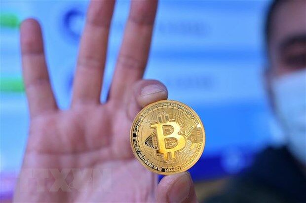 Giá Bitcoin lên mức kỷ lục, vượt ngưỡng 60.000 USD