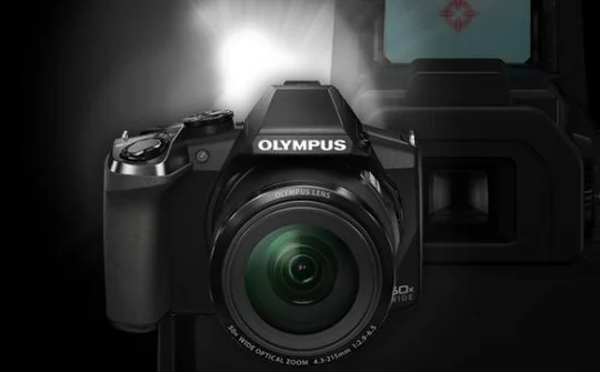 Olympus quyết thua đủ cùng Canon, Nikon