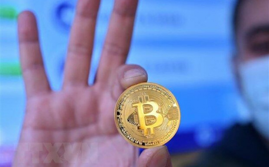 Giá Bitcoin lên mức kỷ lục, vượt ngưỡng 60.000 USD